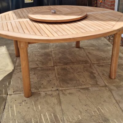 Large, round, Teak Garden Table, seats 10. From Kingsley Smythe.