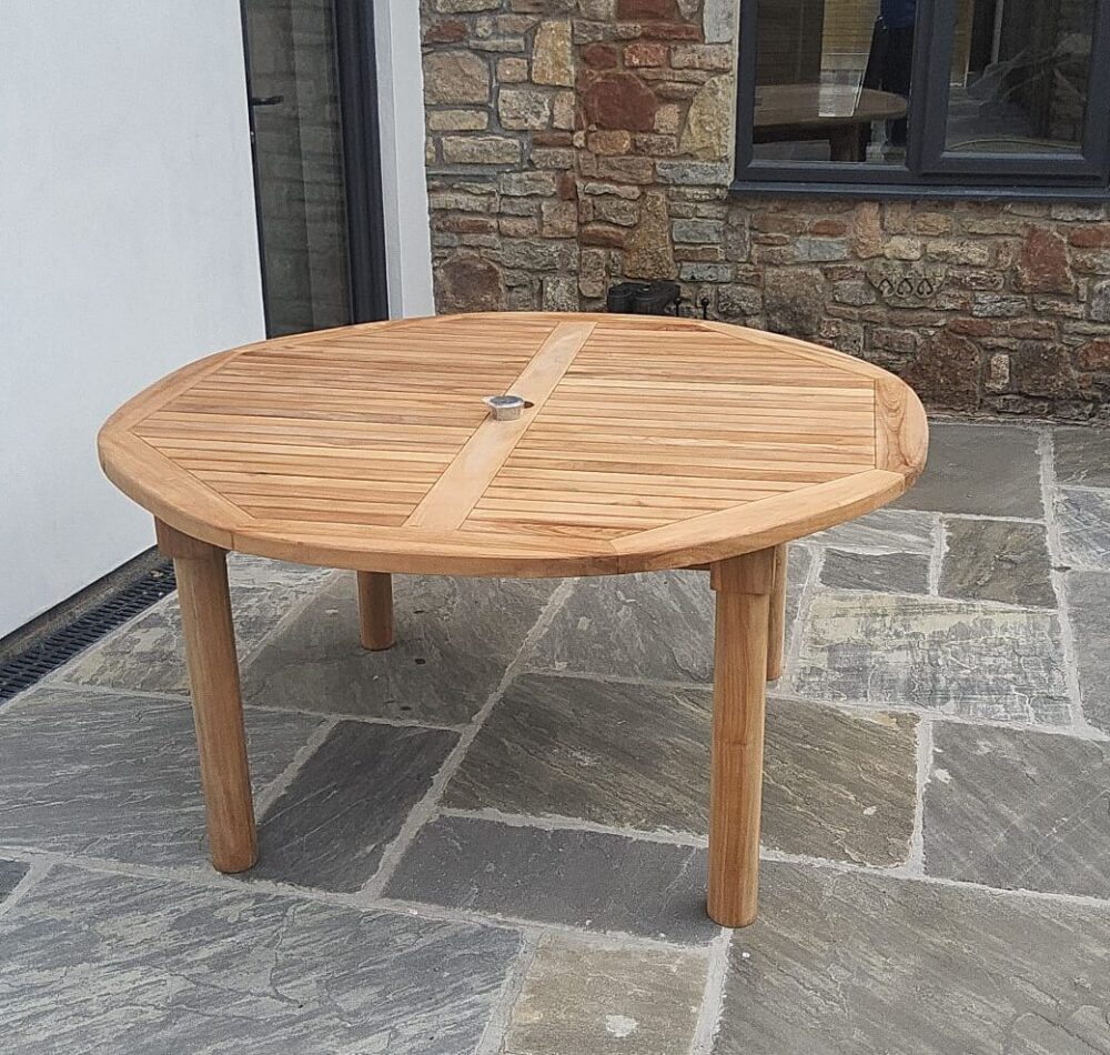 Large, teak garden dining table. Seats 8 - 10 people. From Kingsley Smythe